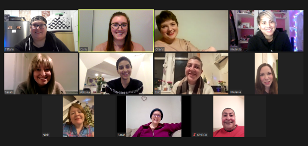 Screenshot of zoom online support meeting showing smiling participants 