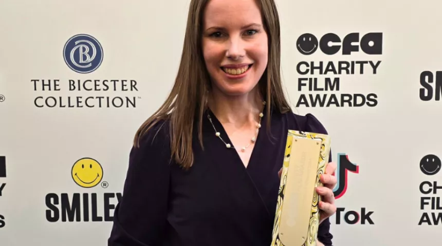 Deborah holding our Smiley Film Award
