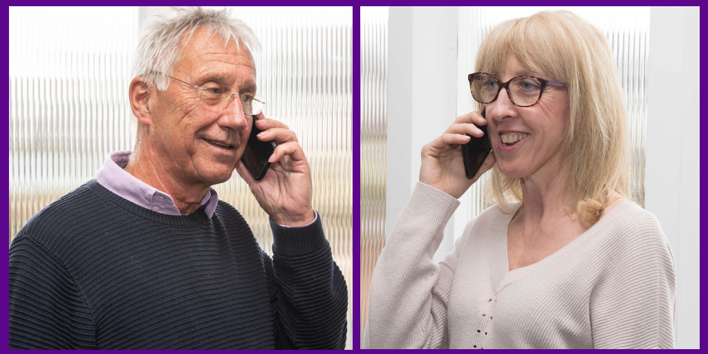 Male and female on the phone offering support 