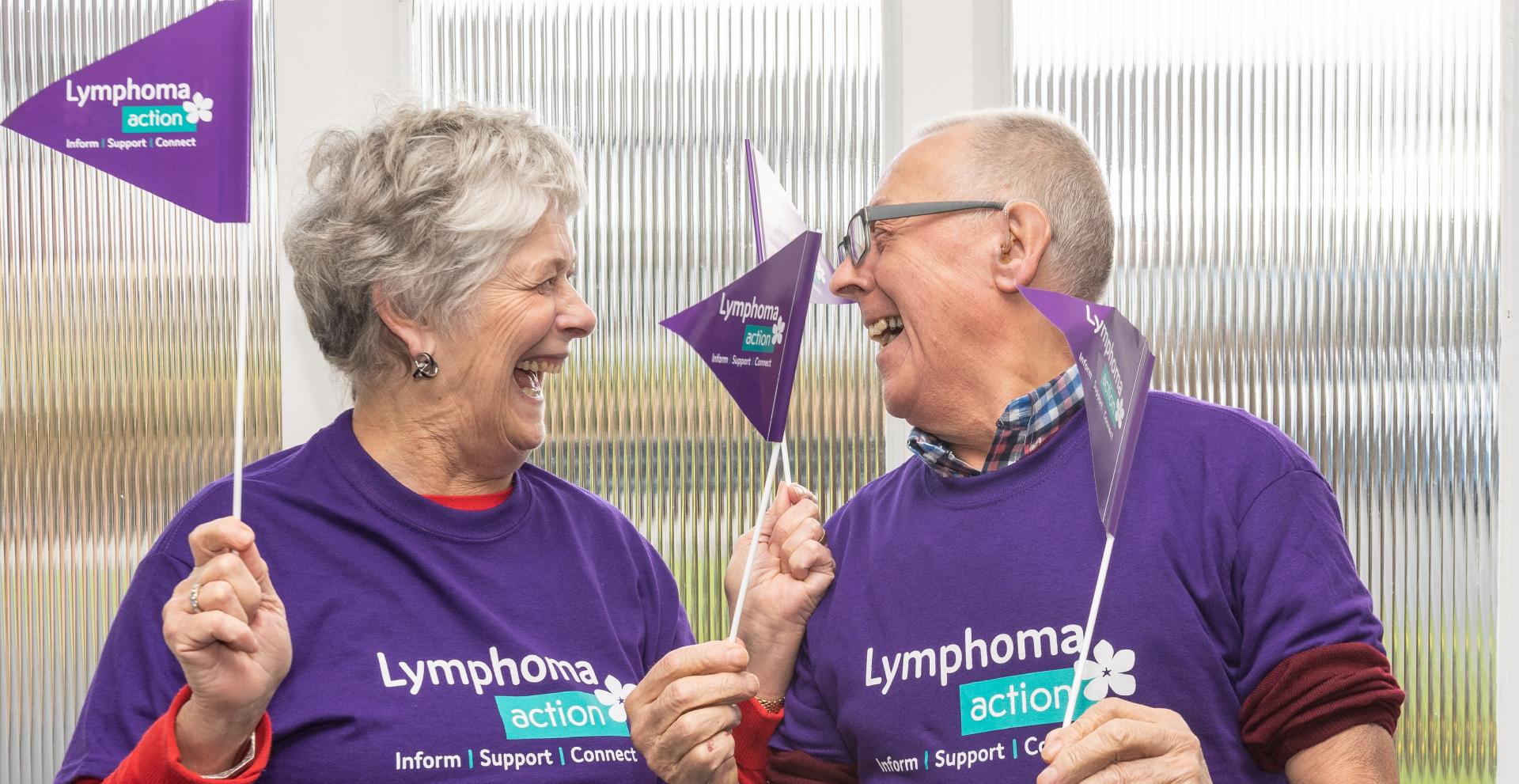 Female & male with Lymphoma Action flags