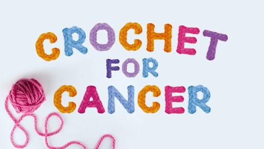 Crochet for cancer logo with a ball of wool