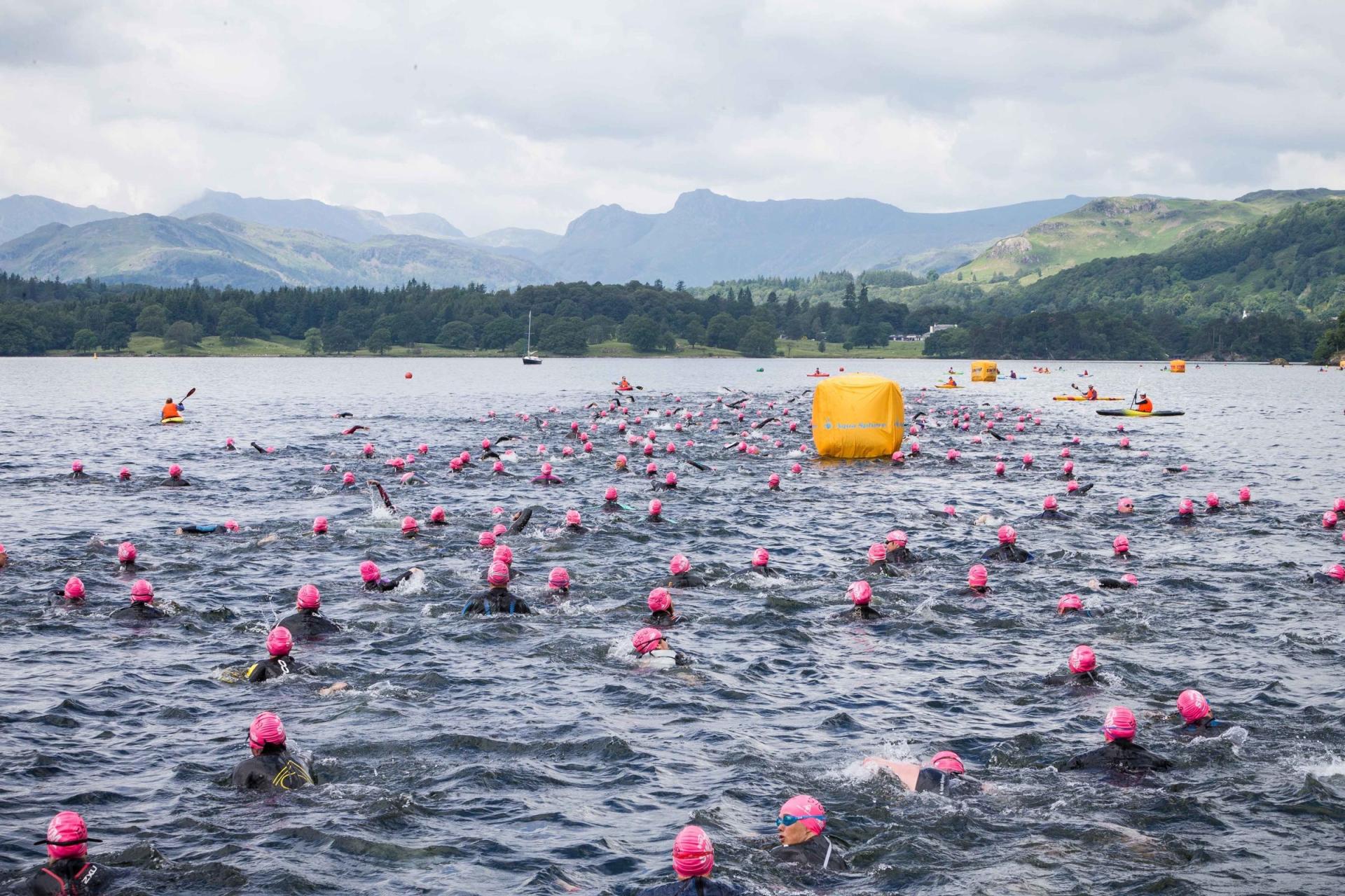 hundreds of swimmers, swimming in Lake Windermere