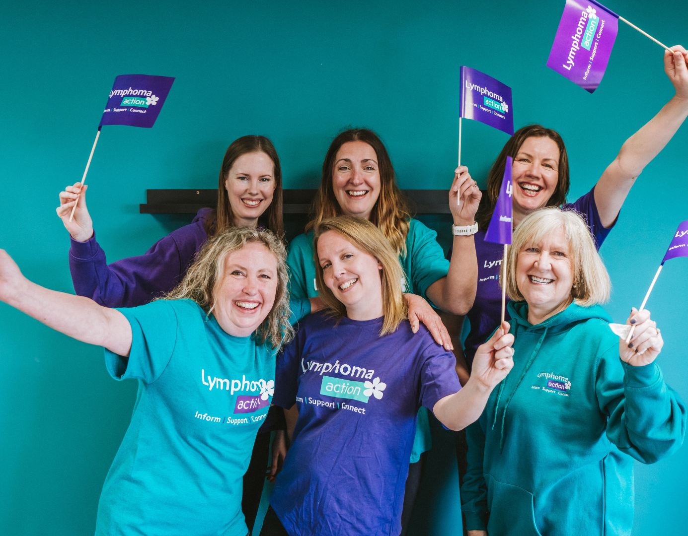 Lymphoma Action staff waving flags