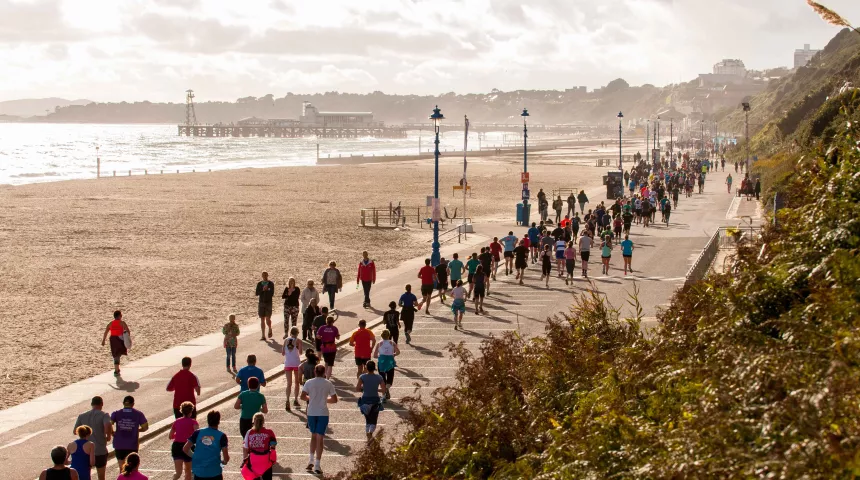 Hundreds of runners alongside Bournemouth Coastline