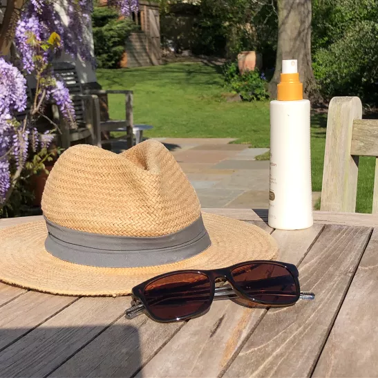 Sunhat, sunglasses and sunscreen